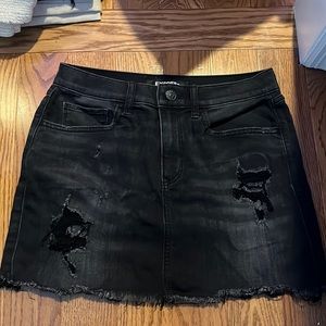 Ripped black jean skirt
